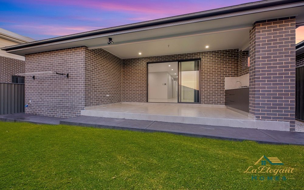 Tiled alfresco built under the main roof of an LA Elegant Homes build