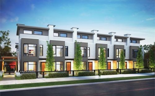 Row of contemporary two-storey townhouses with landscaped street frontage